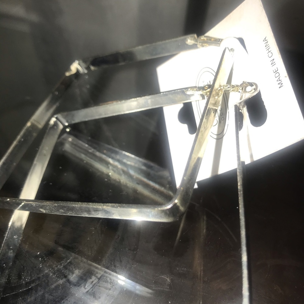 Silver hoop earring